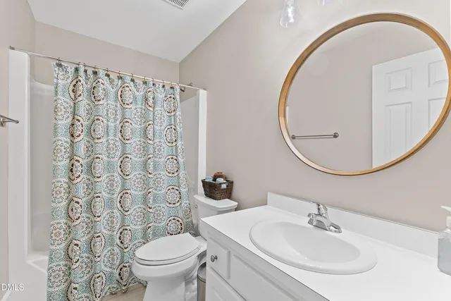 a view of a balcony with wooden floor