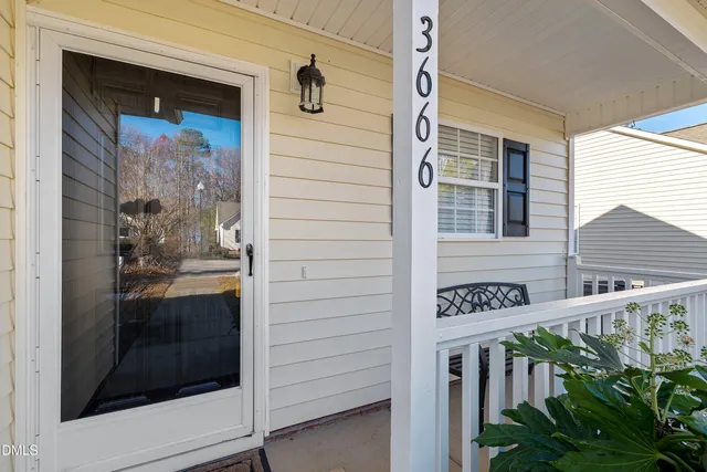 a view of a door and a street view