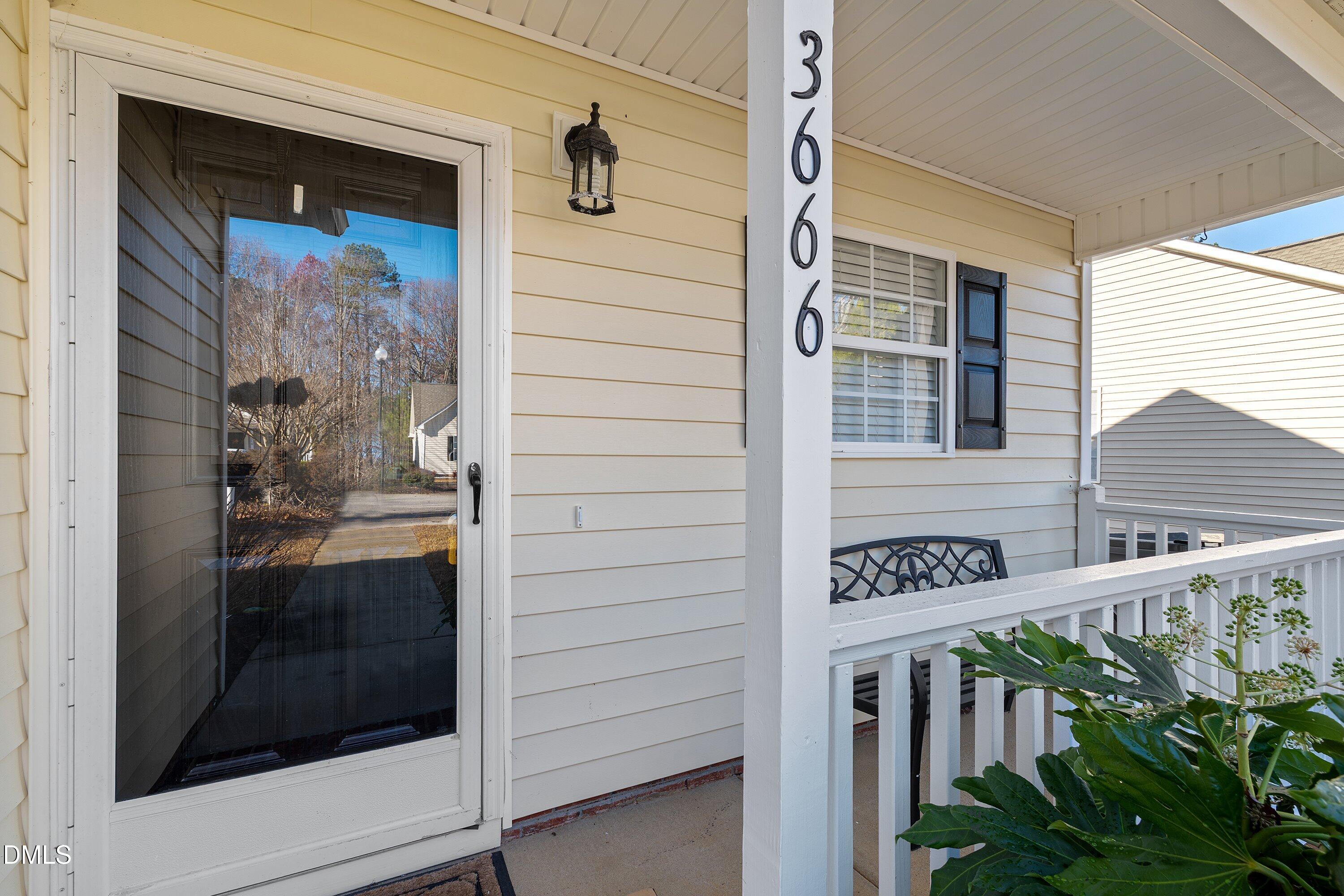 3666 East Cotton Gin Drive Clayton, NC 27527 - Photo 5 of 33 a view of a door and a street view