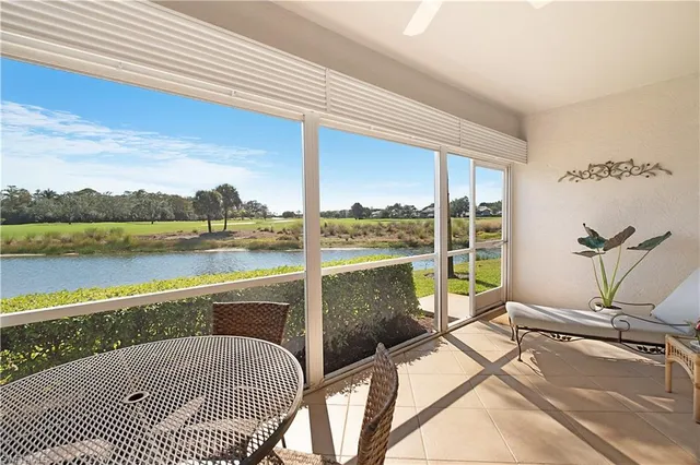 a view of a balcony with lake view and mountain view