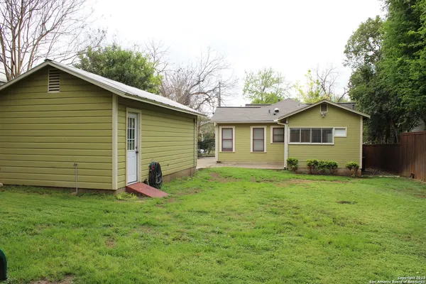 a view of a backyard with a garden