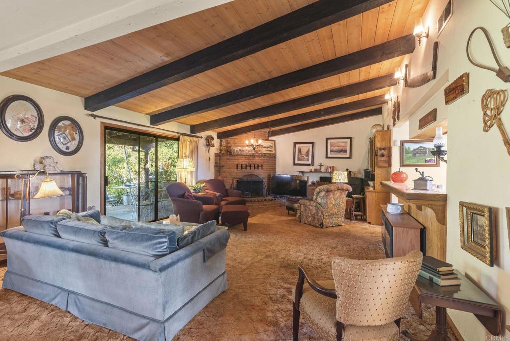 3414 Royal Road Vista, CA 92084 - Photo 11 of 48 a living room with furniture and wooden floor