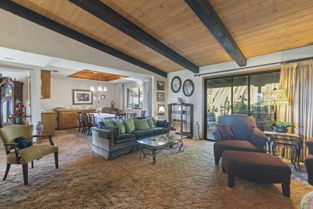 3414 Royal Road Vista, CA 92084 - Photo 12 of 48 a living room with furniture and a large window