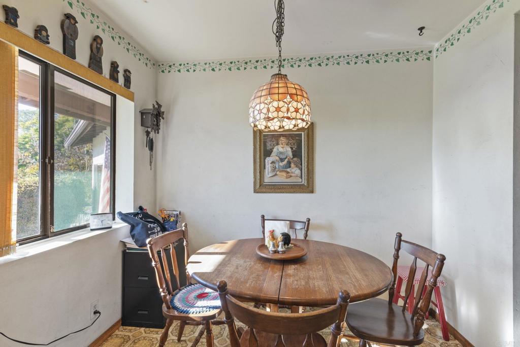 3414 Royal Road Vista, CA 92084 - Photo 15 of 48 a view of a dining room with furniture and a window