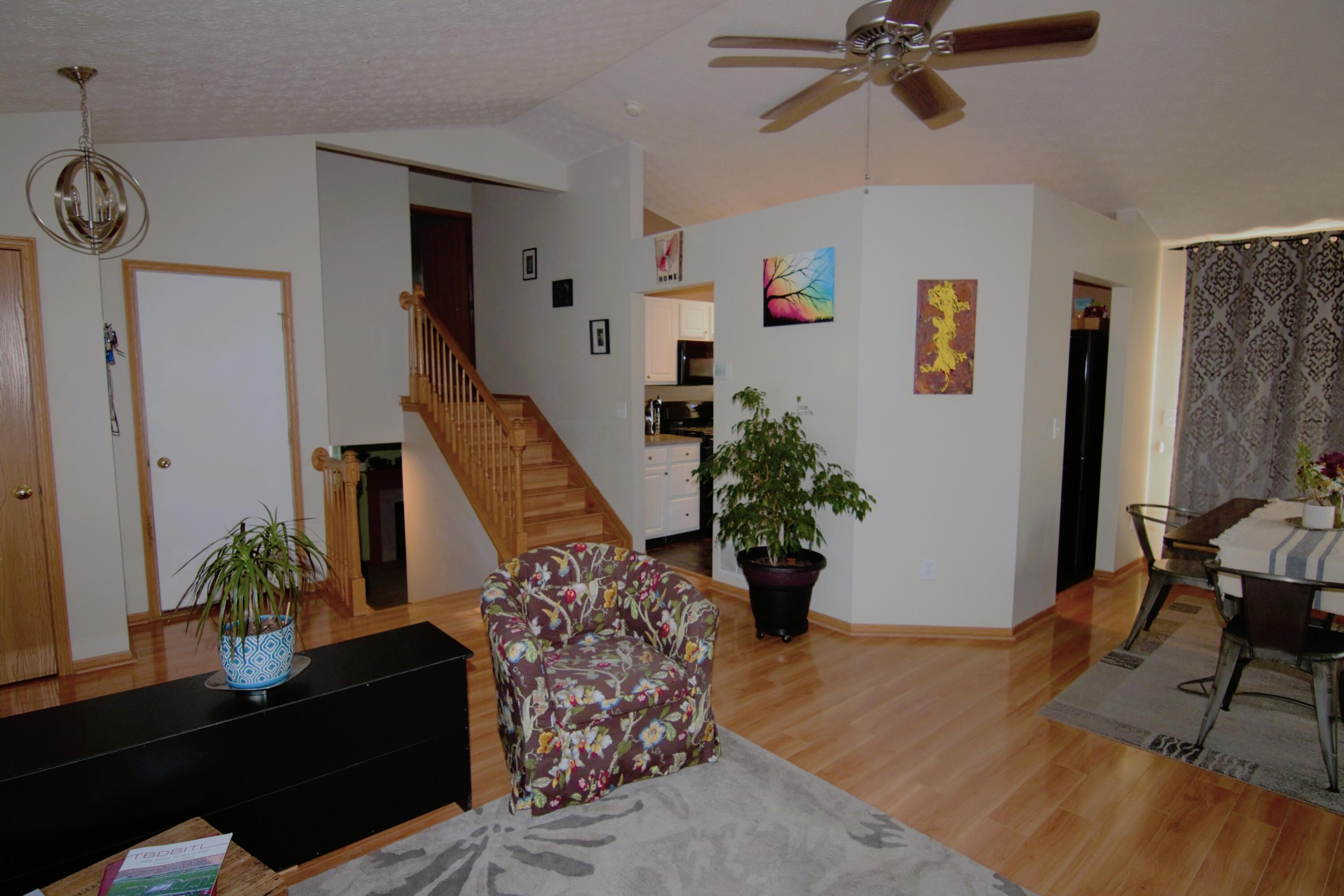 4571 Nickerson Road Columbus, OH 43228 - Photo 9 of 37 The living room and dining area.