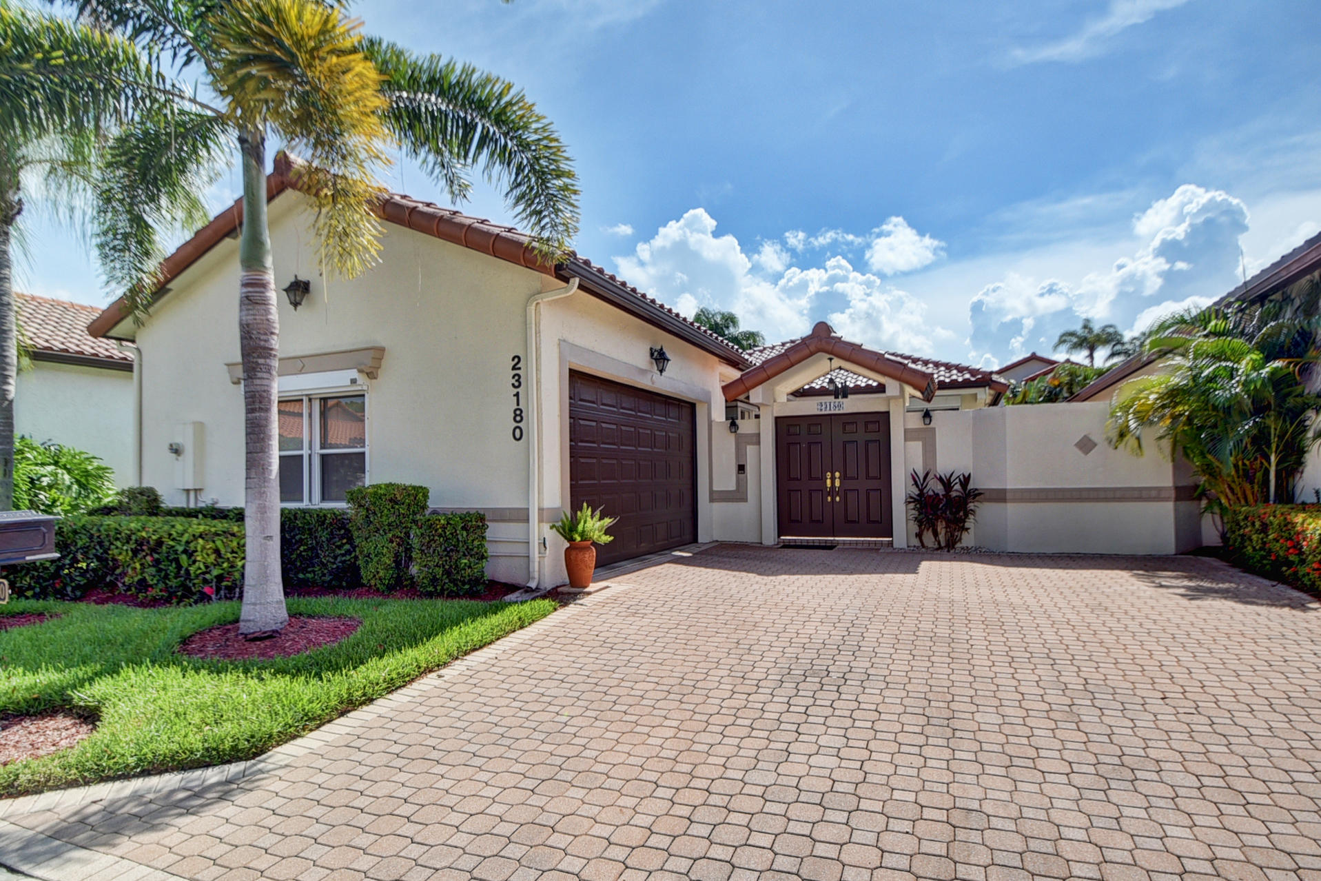 23180 Via Stel Boca Raton, FL 33433 - Photo 1 of 24 Front