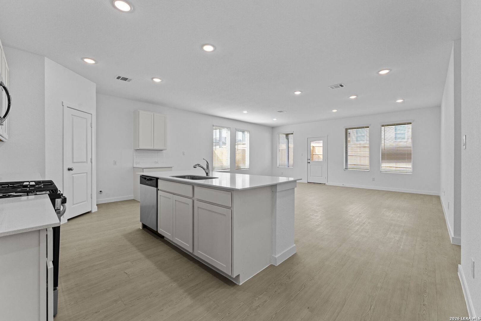 4987 Mission Tejas Road Marion, TX 78124 - Photo 14 of 25 a large white kitchen with a large window