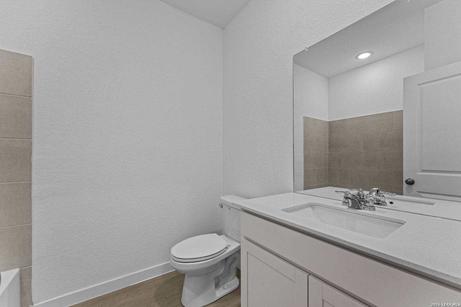 4987 Mission Tejas Road Marion, TX 78124 - Photo 5 of 25 a bathroom with a sink a toilet and mirror