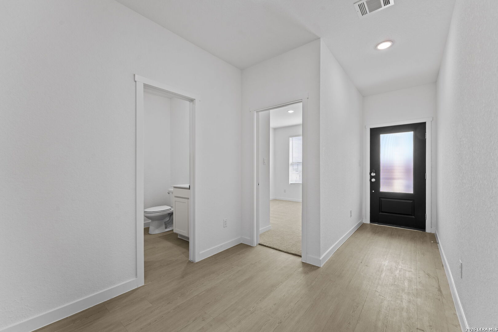 4987 Mission Tejas Road Marion, TX 78124 - Photo 6 of 25 wooden floor and closet in a room