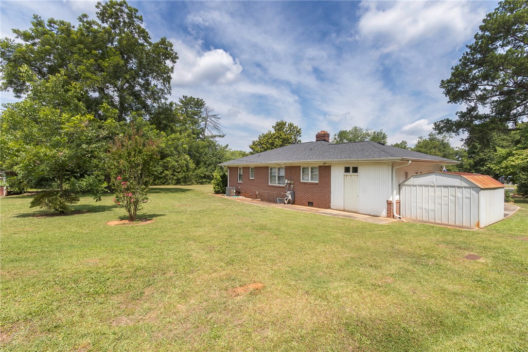 1218 Bolt Drive Anderson, SC 29621 - Photo 40 of 46 A classic brick and siding home with a generous yard provides ample outdoor space.