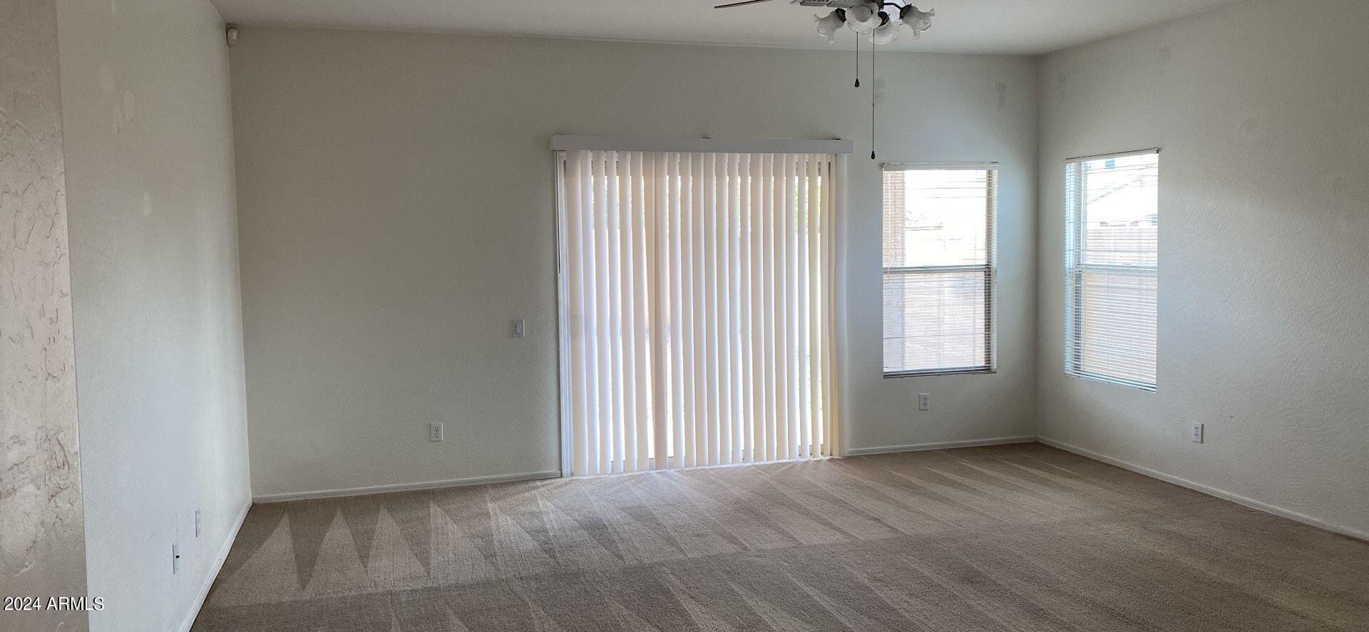 5257 West Shumway Farm Road Laveen, AZ 85339 - Photo 2 of 13 a view of an empty room with a window