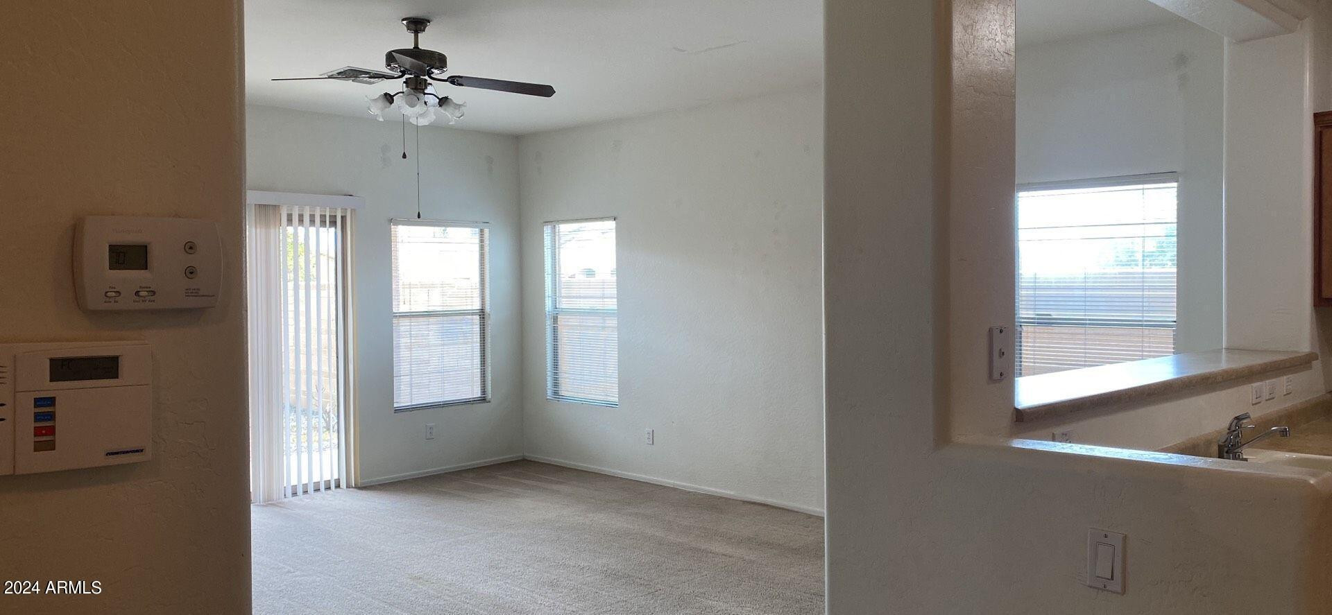 5257 West Shumway Farm Road Laveen, AZ 85339 - Photo 3 of 13 a view of an empty room with a window