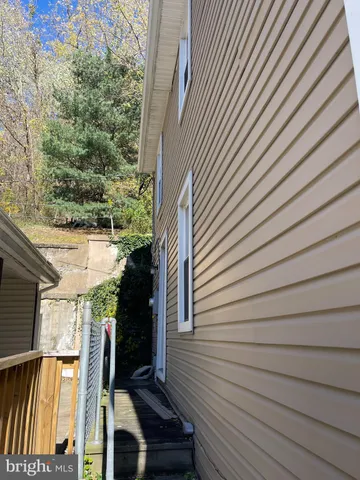 a view of barbeque area with seating