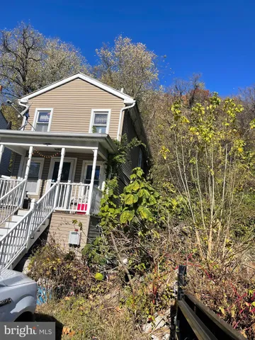 a house view with a garden space