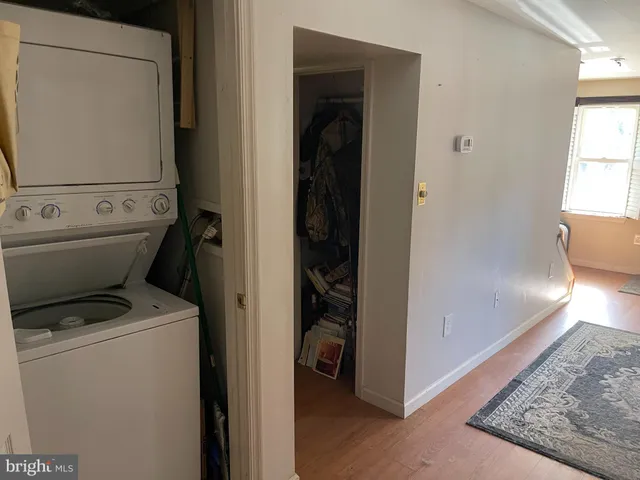 a view of bathroom with a washer and dryer