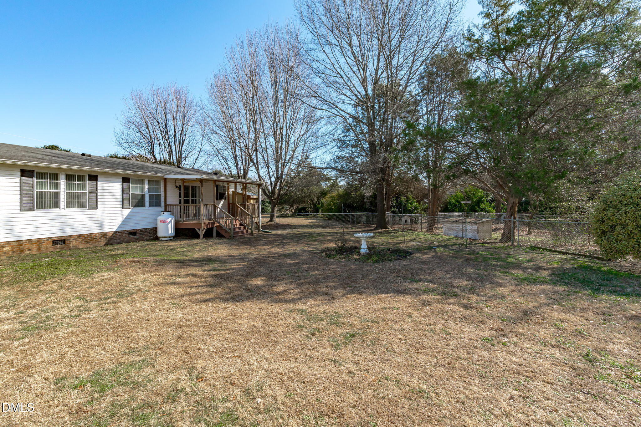 7900 Barbour Store Road Willow Spring, NC 27592 - Photo 28 of 38 Mature hardwood and pine trees, room for garden, pets, and play.