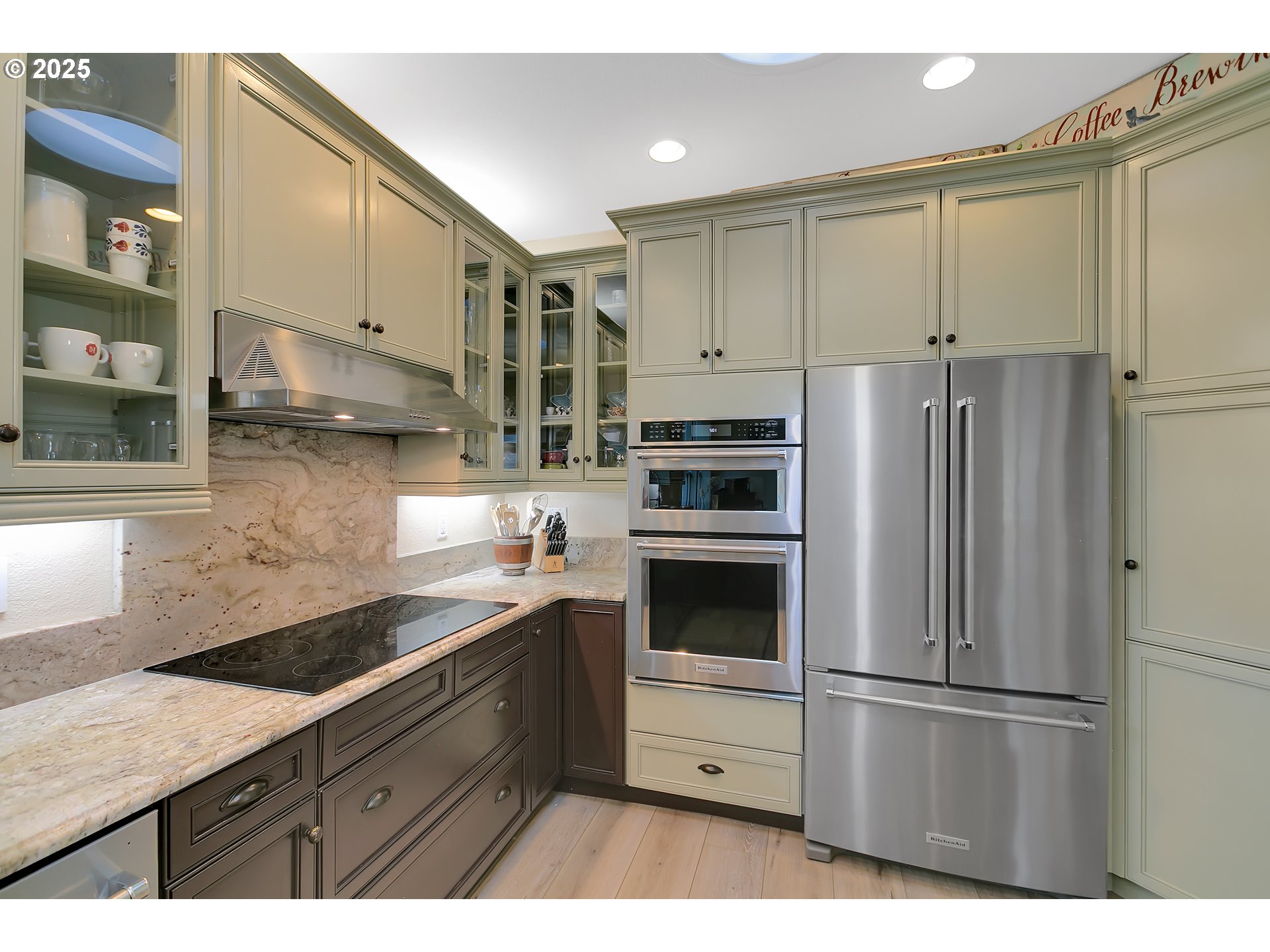 160 Southwest 59th Street South Beach, OR 97366 - Photo 15 of 45 a kitchen with stainless steel appliances a refrigerator sink and cabinets
