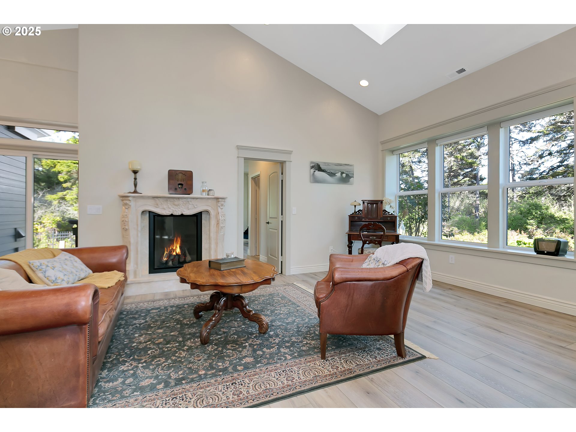 160 Southwest 59th Street South Beach, OR 97366 - Photo 17 of 45 a living room with furniture and a fireplace