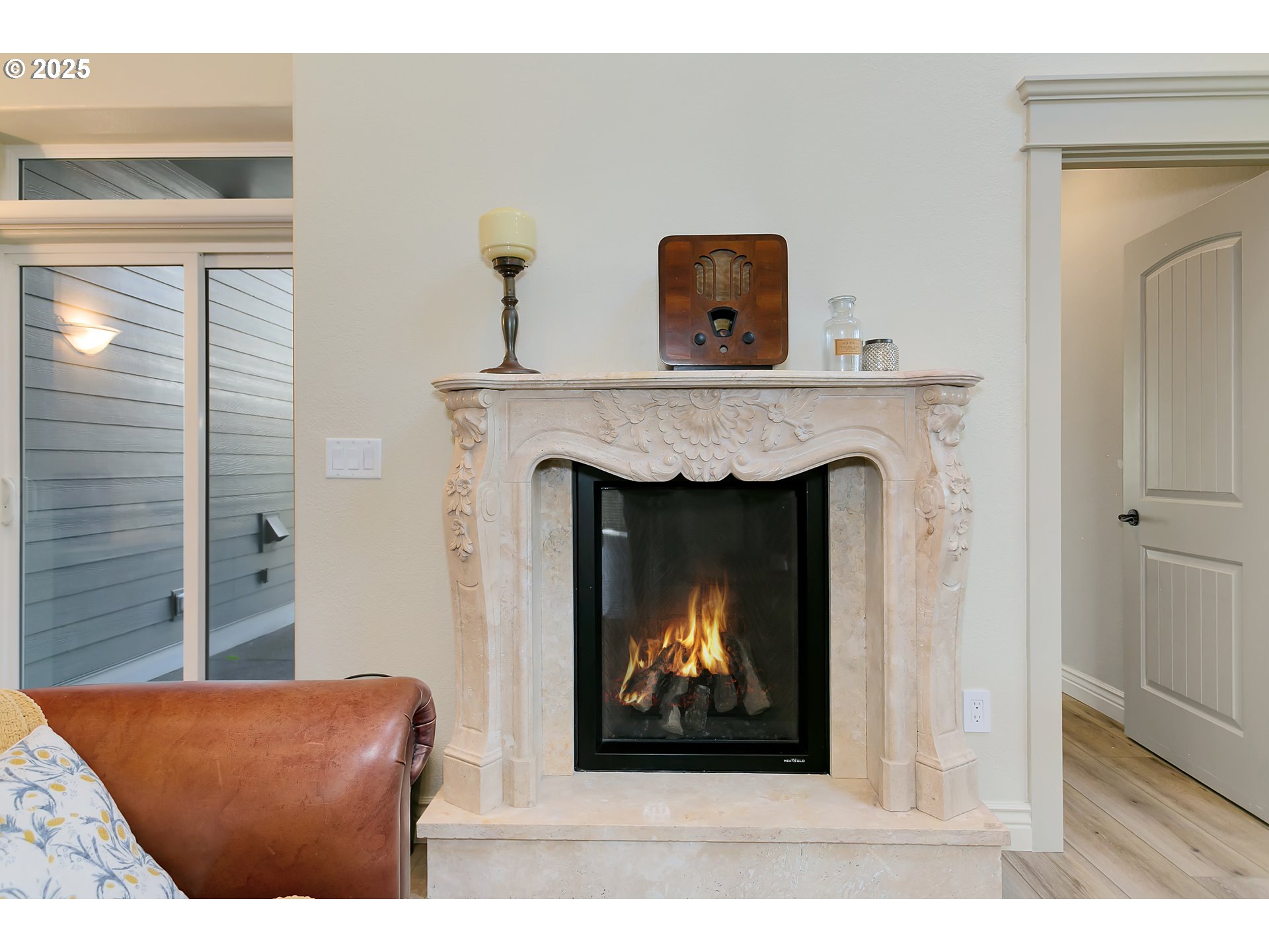 160 Southwest 59th Street South Beach, OR 97366 - Photo 18 of 45 a living room with furniture and a fireplace