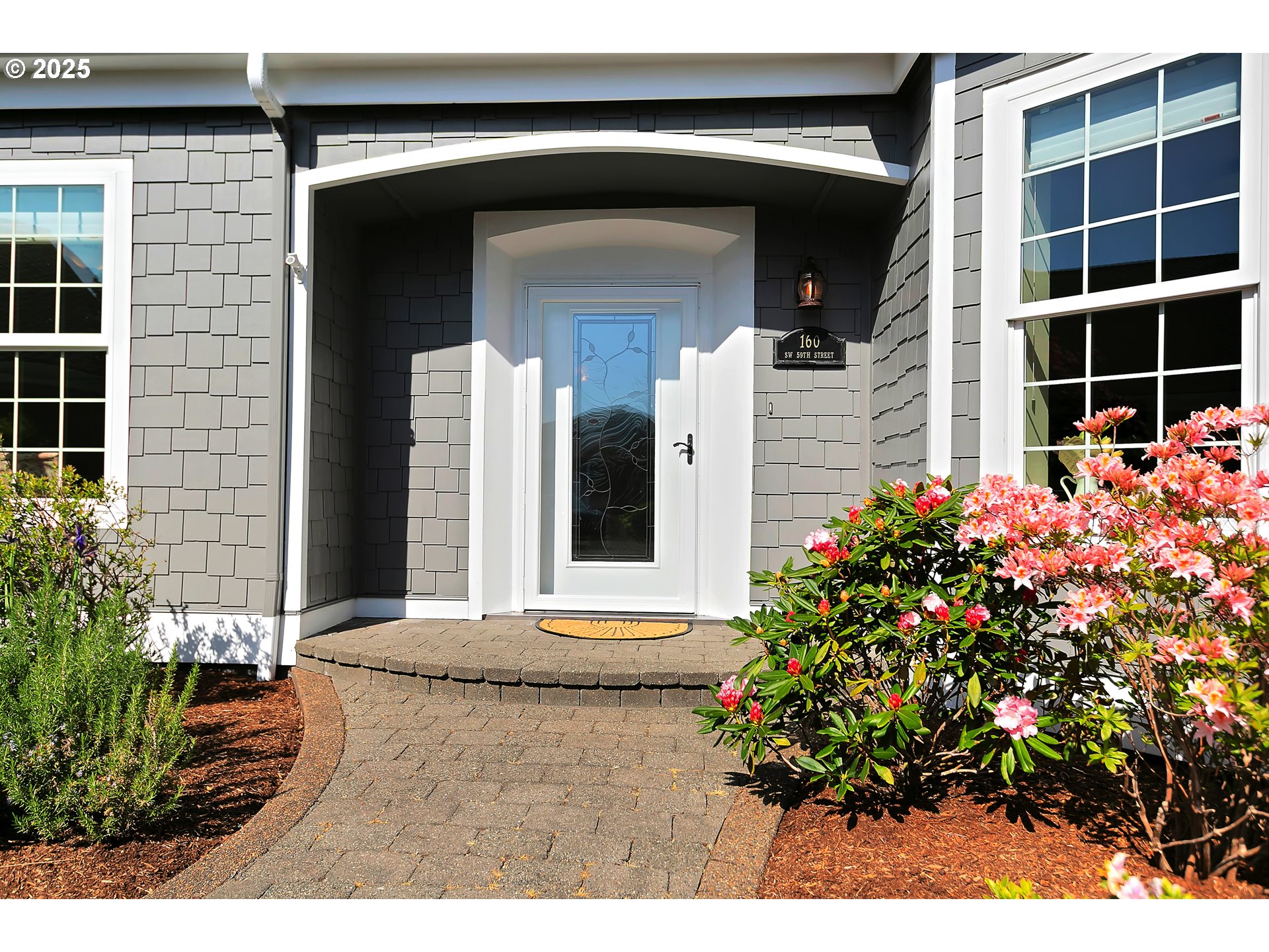 160 Southwest 59th Street South Beach, OR 97366 - Photo 3 of 45 a view of a entryway front of house
