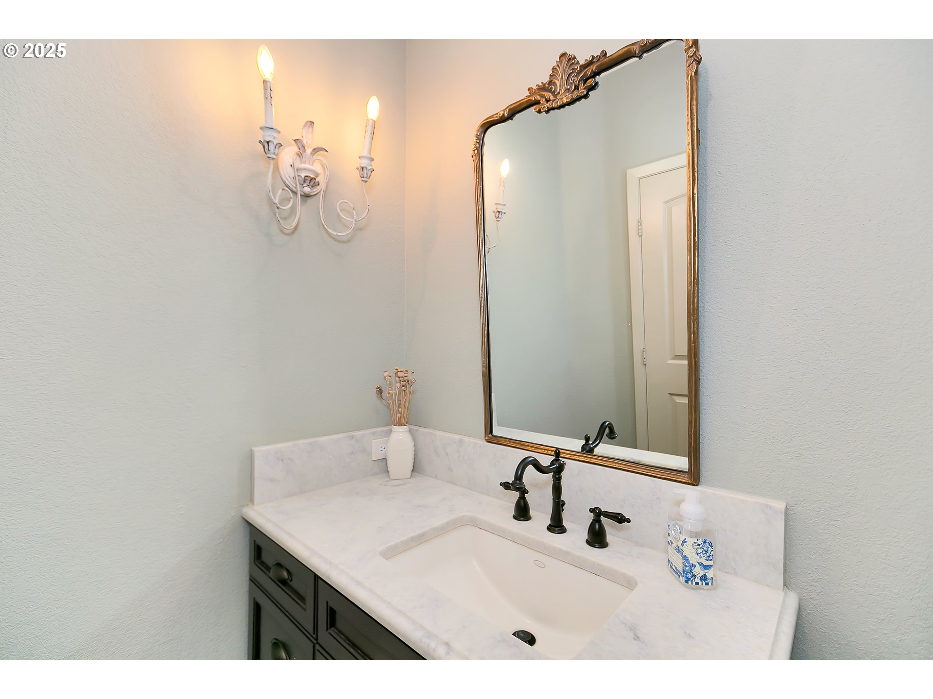 160 Southwest 59th Street South Beach, OR 97366 - Photo 9 of 45 a bathroom with a sink and mirror