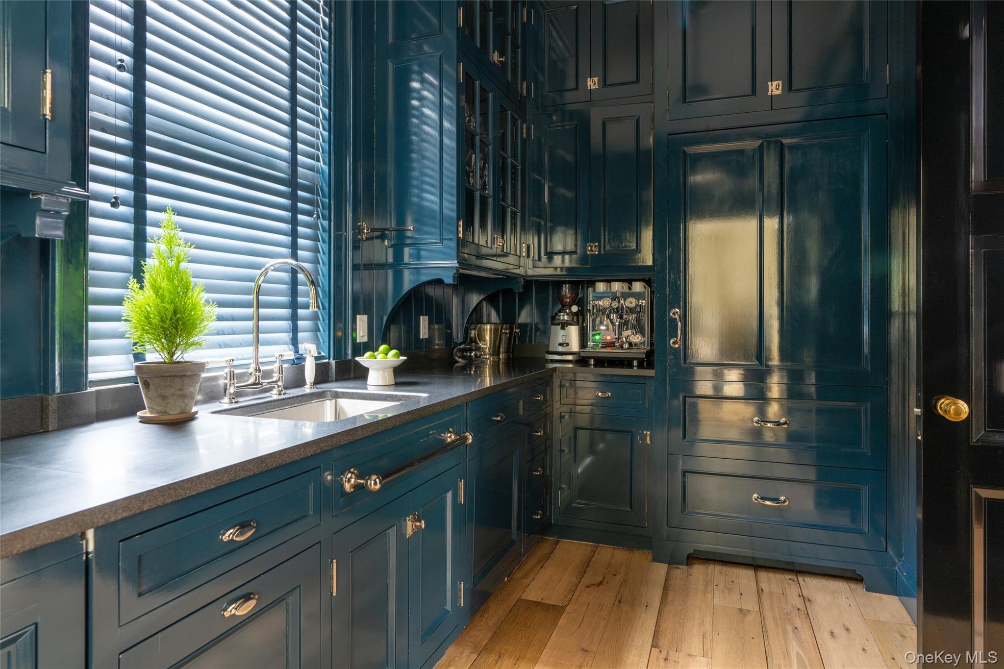 1190 Chestnut Ridge Road Dover Plains, NY 12522 - Photo 11 of 42 Kitchen with light wood-style floors and dark countertops