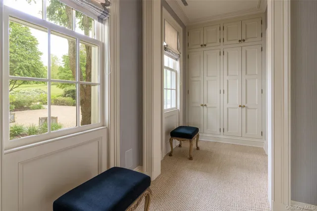 a view of a chair near a window