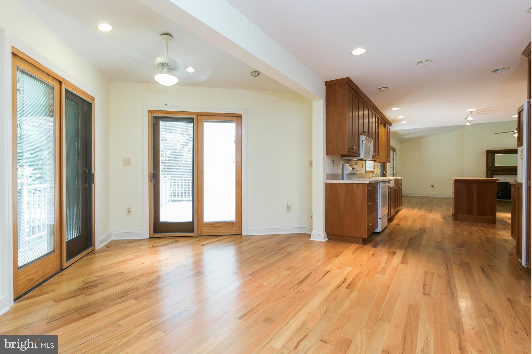 8340 Waverly Road Owings, MD 20736 - Photo 15 of 30 a view of a kitchen with wooden floor