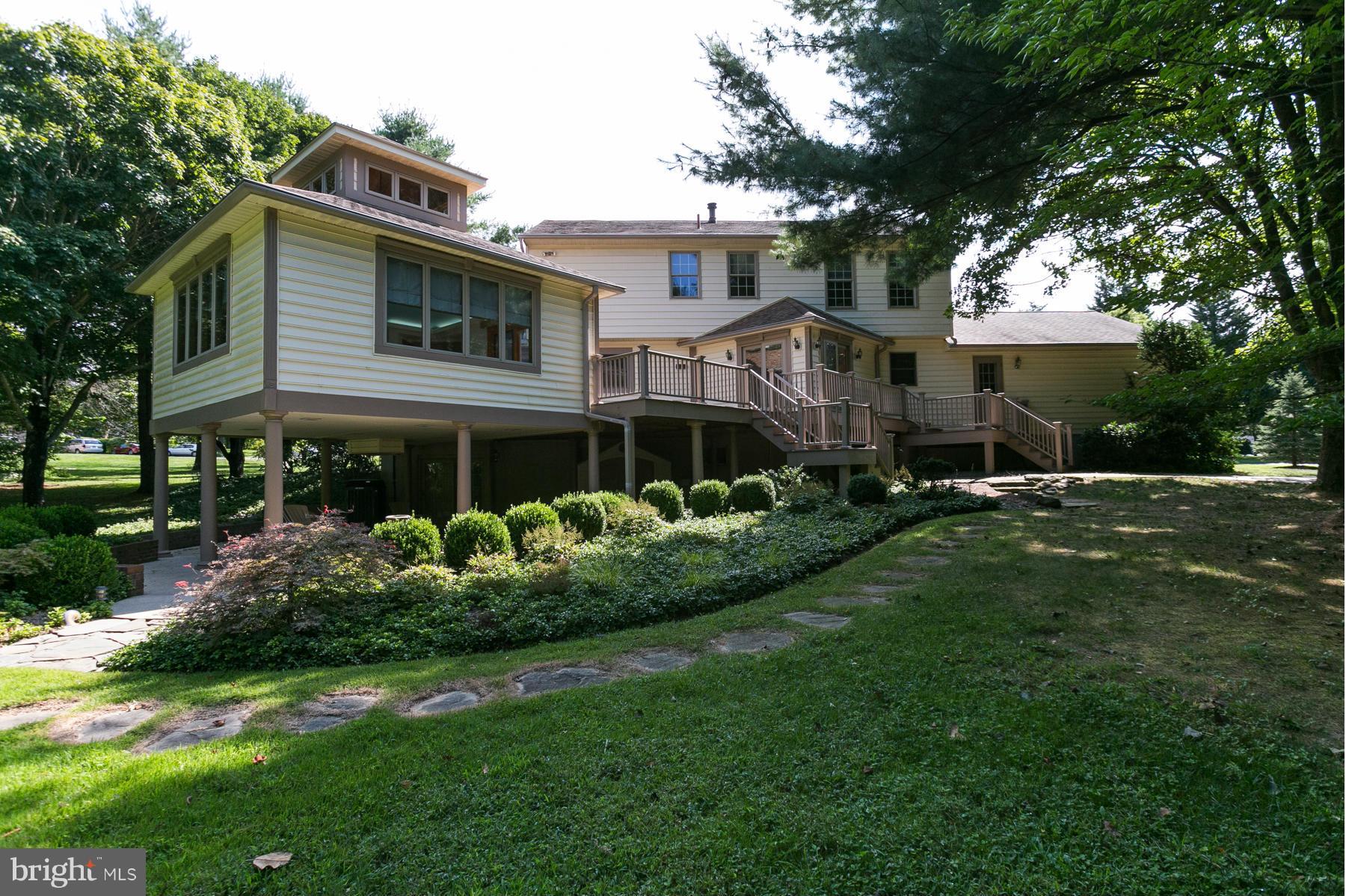 8340 Waverly Road Owings, MD 20736 - Photo 6 of 30 a front view of a house with a garden