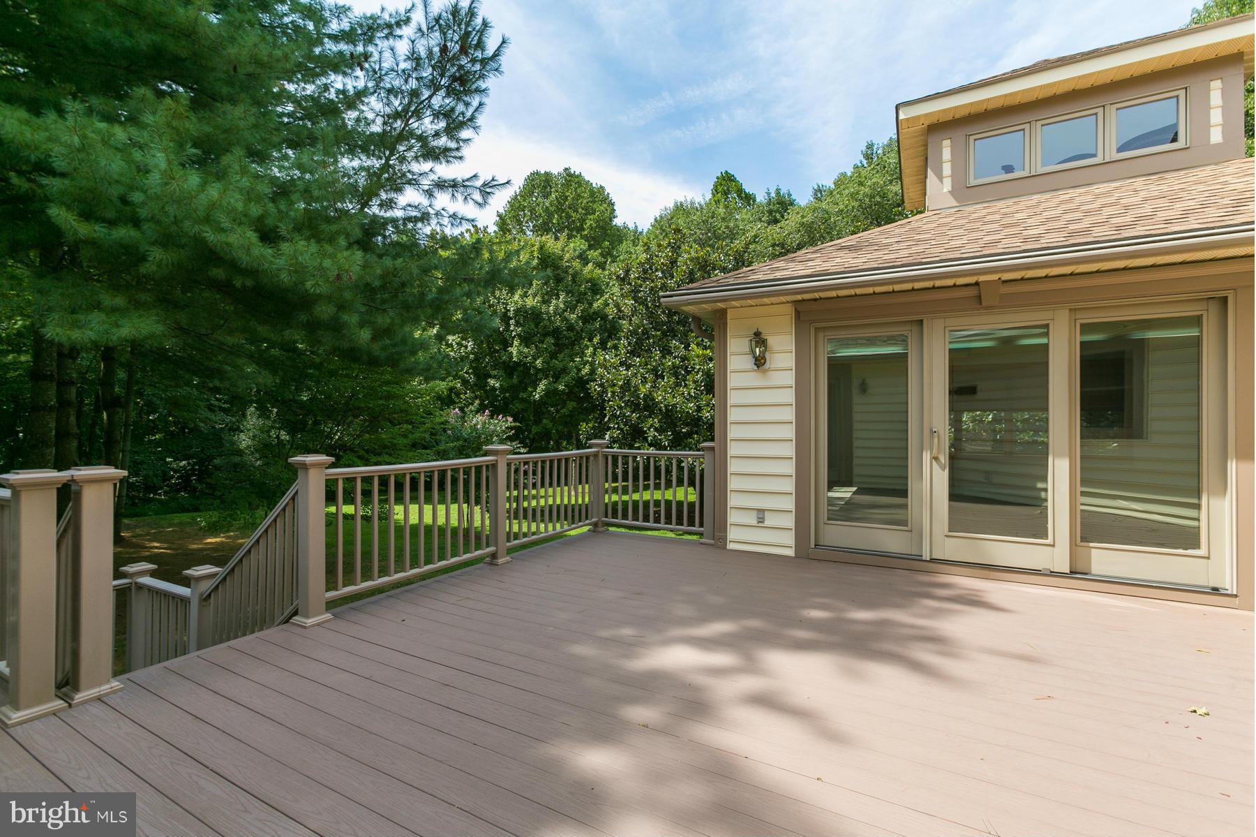 8340 Waverly Road Owings, MD 20736 - Photo 9 of 30 a view of a house with a wooden deck
