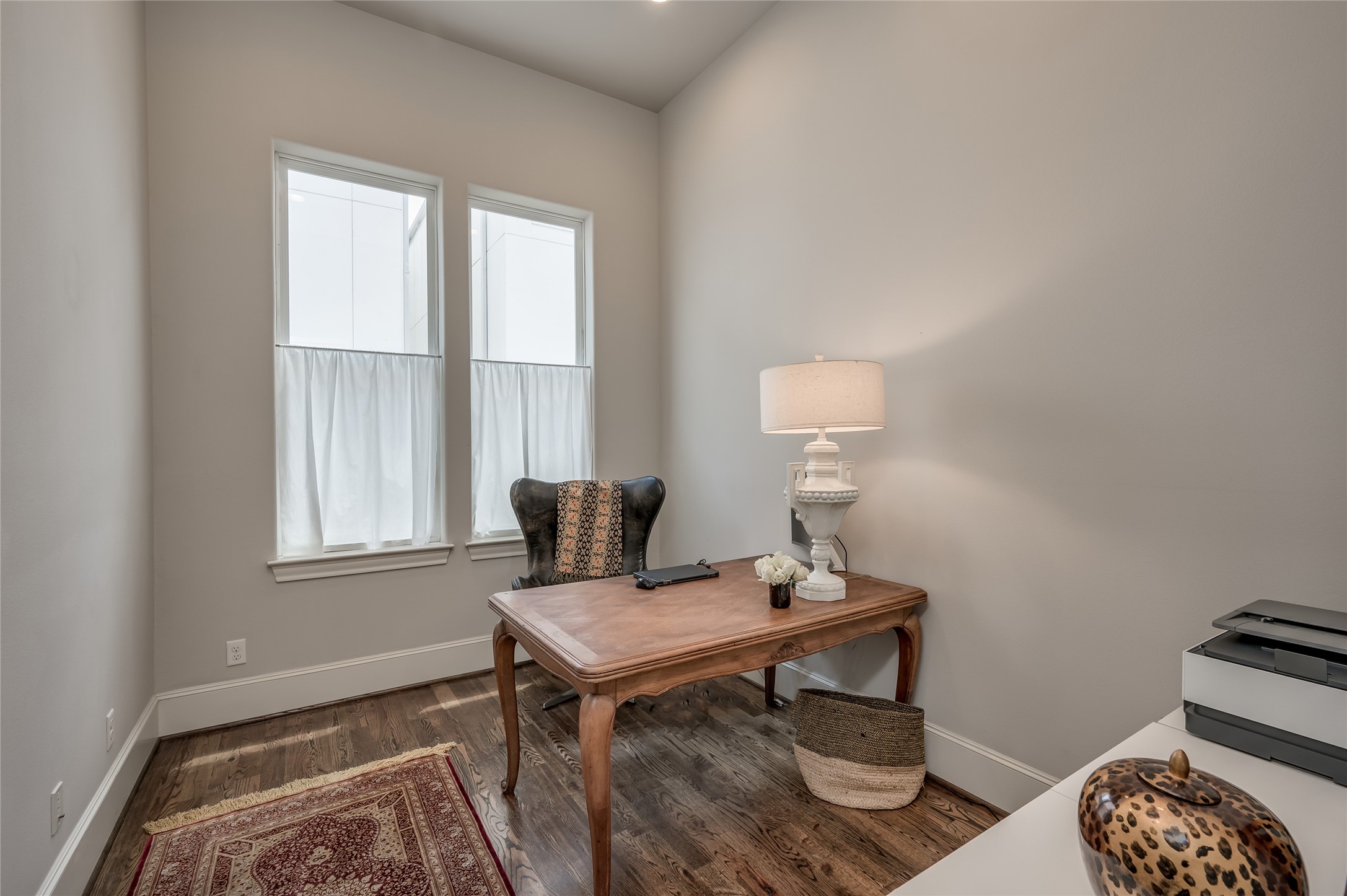 266 East 28th Street Houston, TX 77008 - Photo 17 of 33 a view of a workspace with furniture and a window