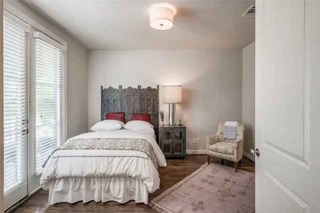 a bathroom with a sink toilet vanity and shower