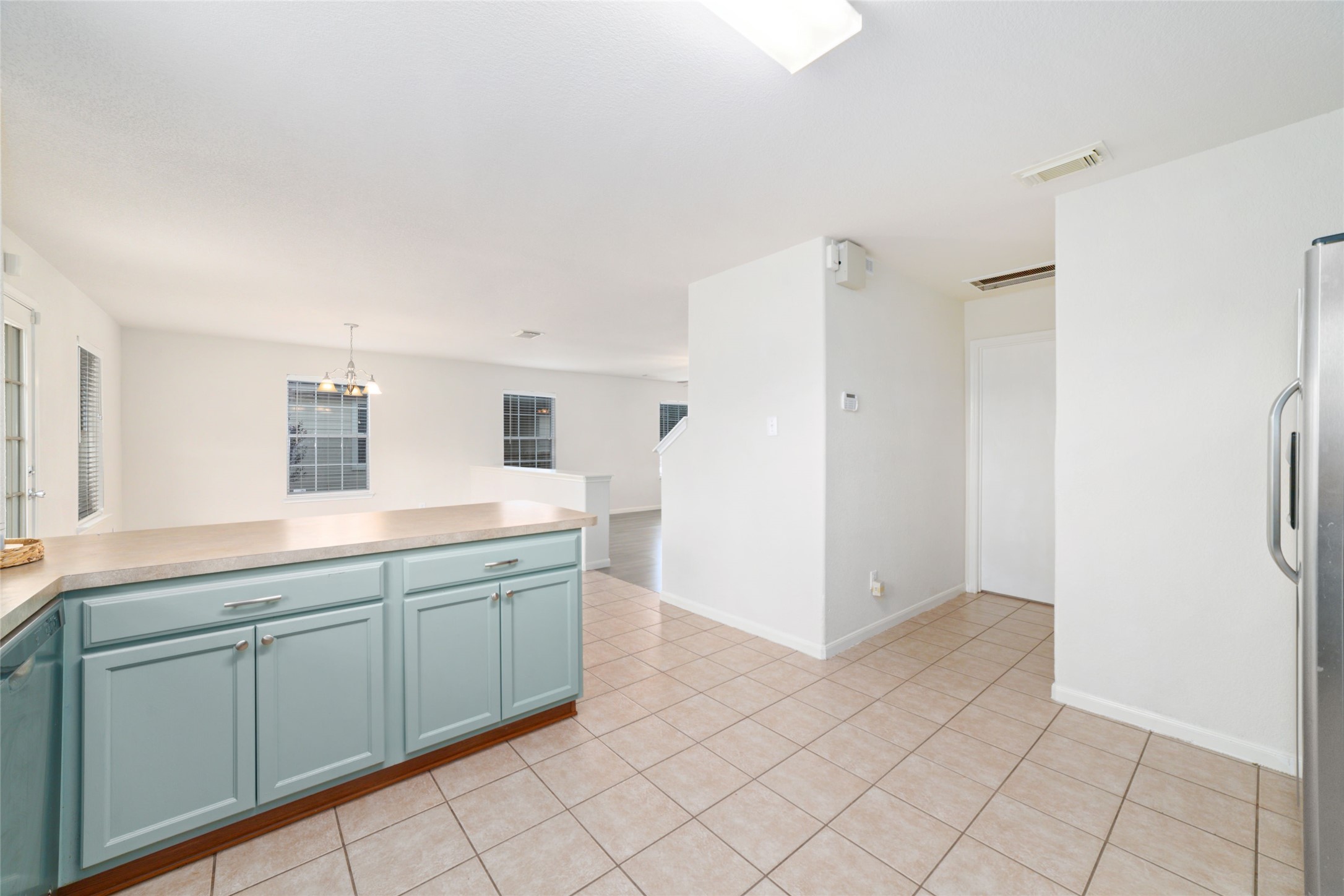 21311 Shadow River Lane Spring, TX 77379 - Photo 22 of 38 a spacious bathroom with a double vanity sink and mirror
