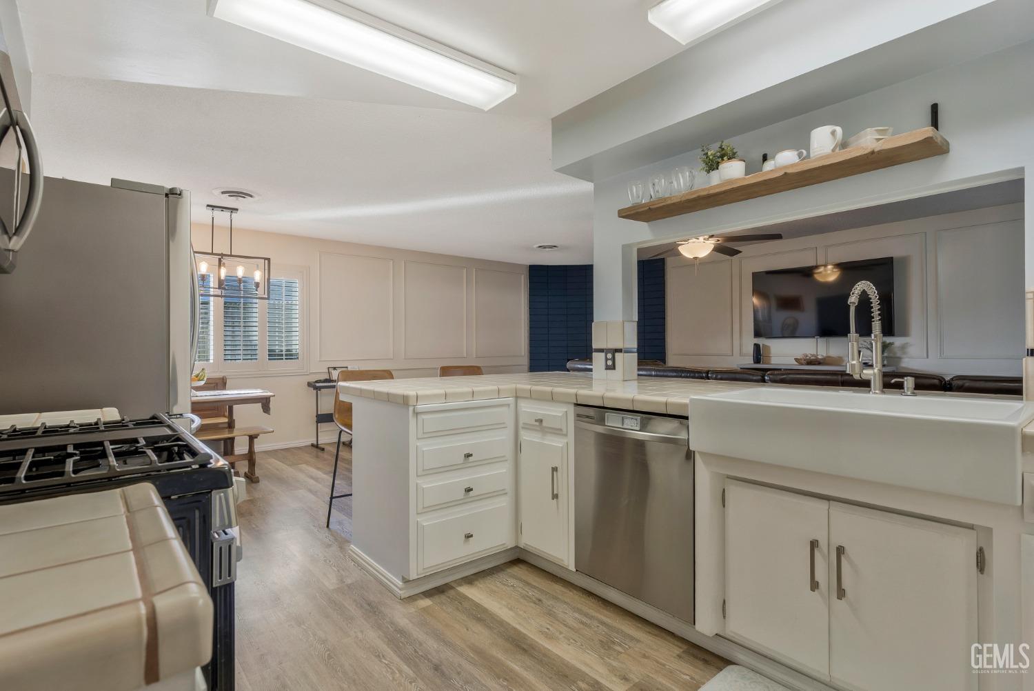 Undisclosed Address Bakersfield, CA 93306 - Photo 13 of 38 a kitchen with cabinets and window