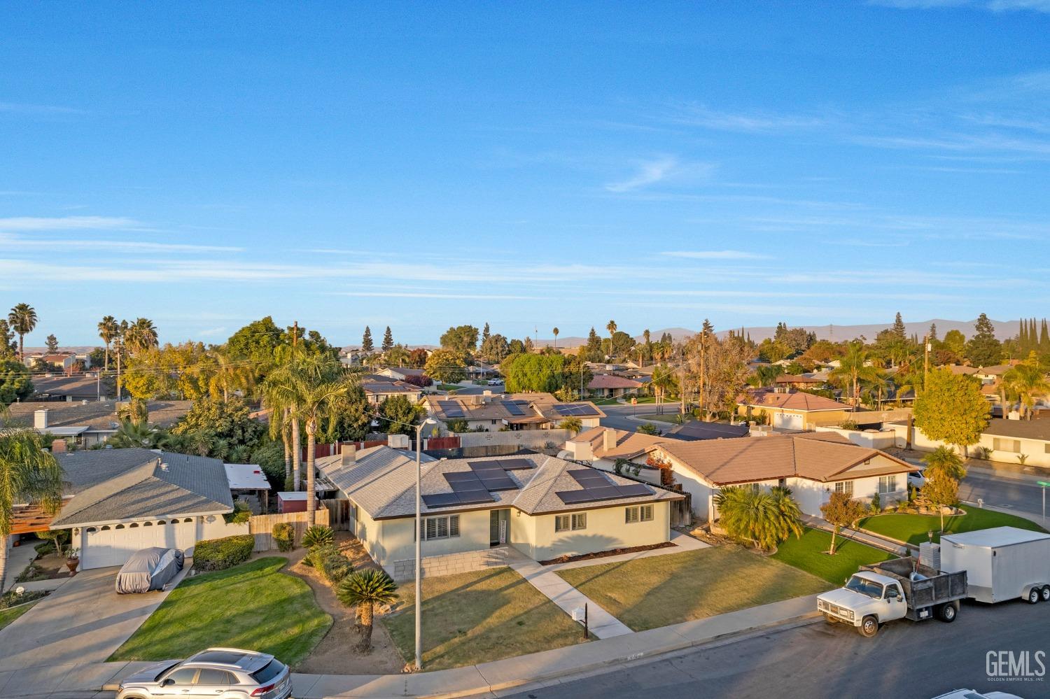 Undisclosed Address Bakersfield, CA 93306 - Photo 3 of 38 an aerial view of residential houses with outdoor space