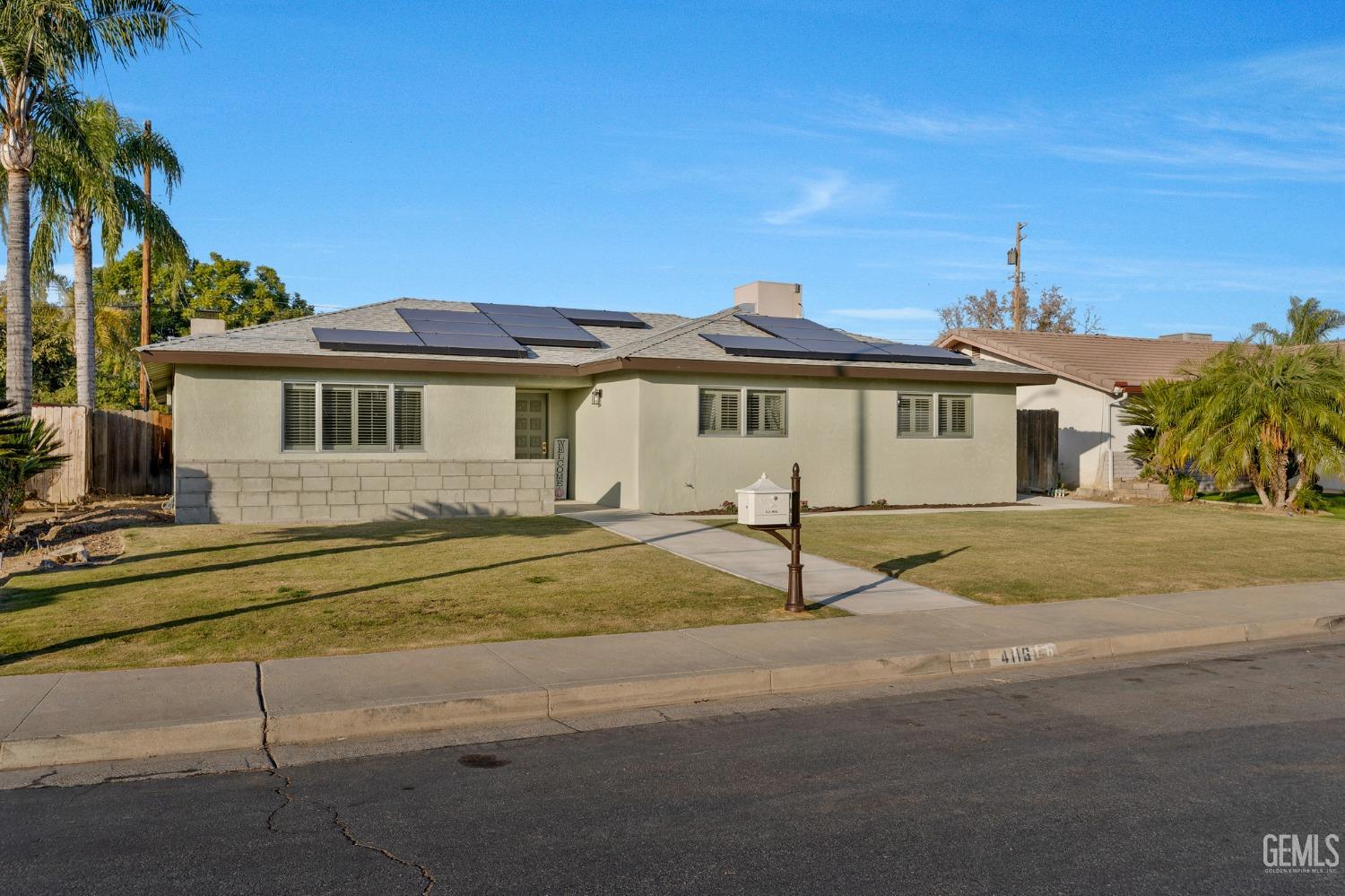 Undisclosed Address Bakersfield, CA 93306 - Photo 36 of 38 a front view of a house with a yard