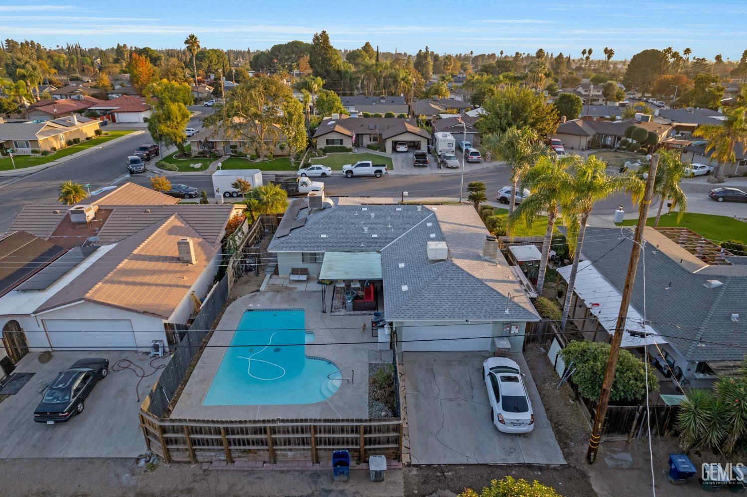 Undisclosed Address Bakersfield, CA 93306 - Photo 5 of 38 an aerial view of residential houses with outdoor space