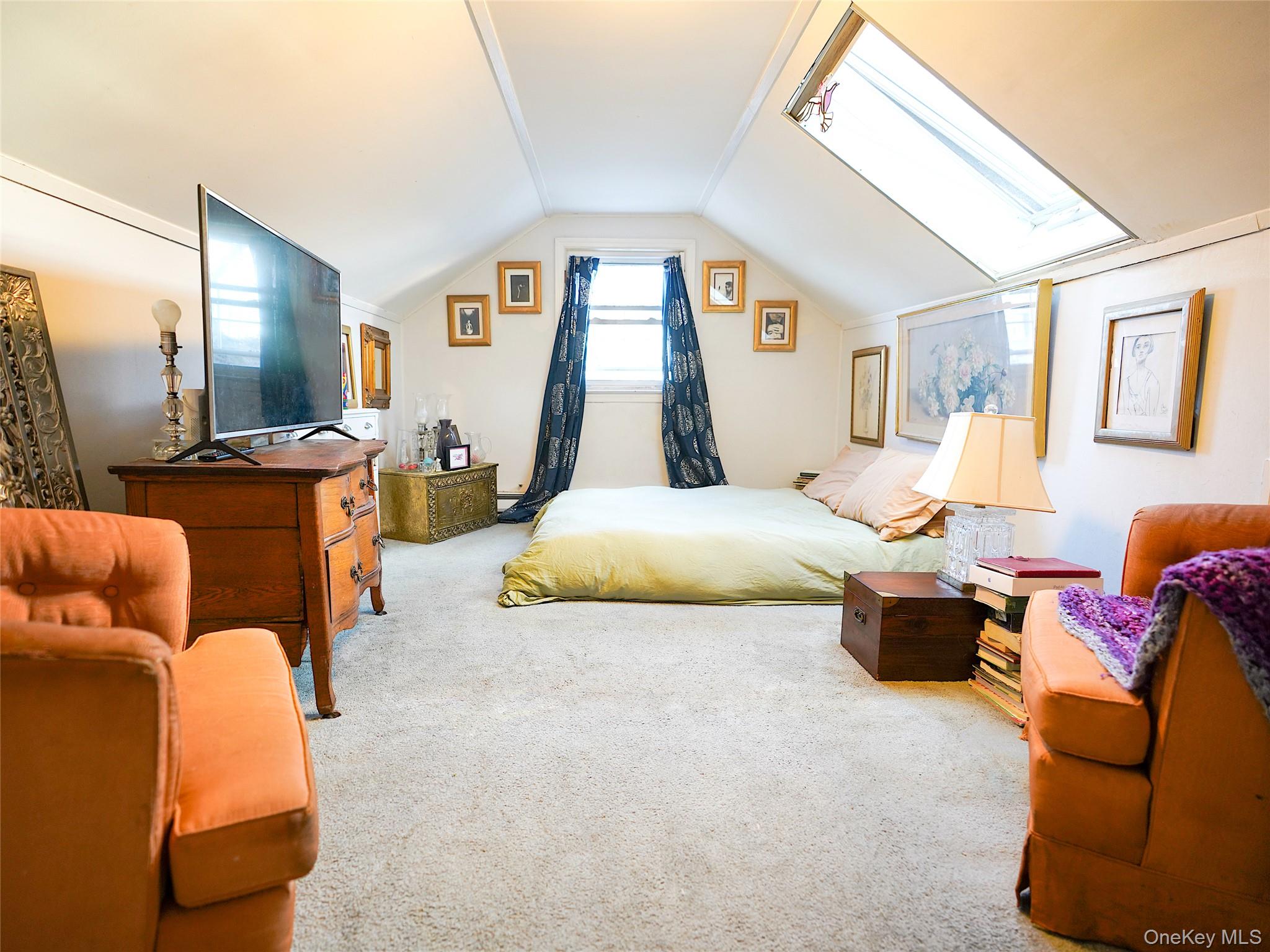 37 Centre Street Bronx, NY 10464 - Photo 12 of 32 a bedroom with a bed and wooden floor