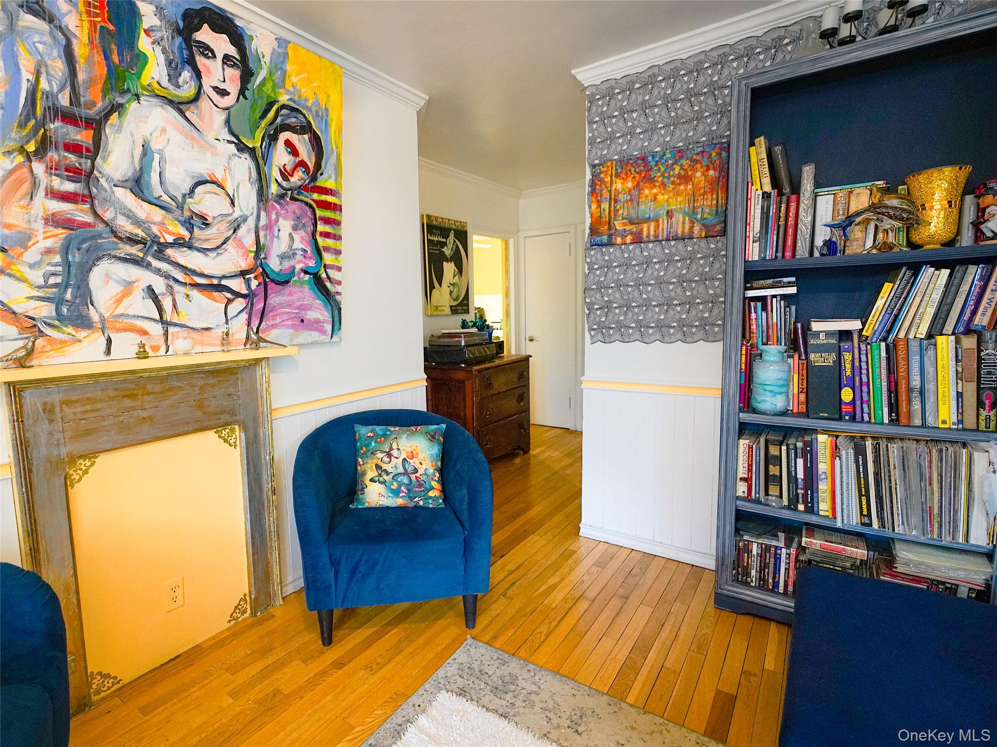 37 Centre Street Bronx, NY 10464 - Photo 20 of 32 a living room with fish tank and a bookshelf
