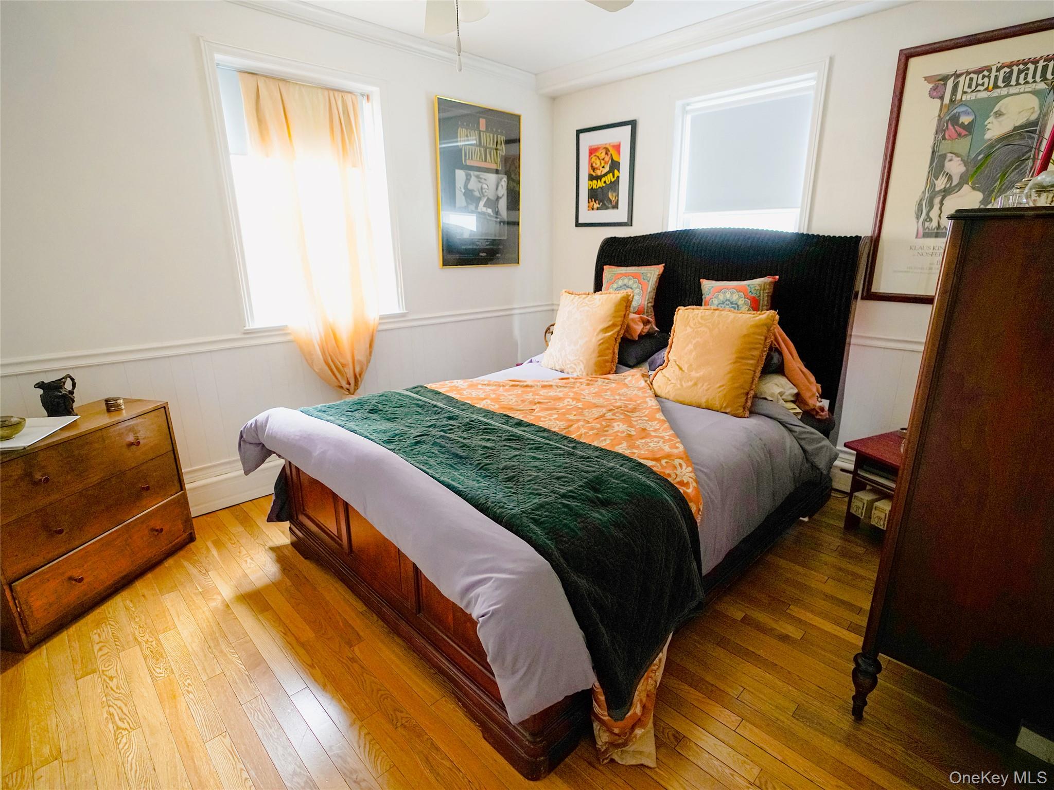 37 Centre Street Bronx, NY 10464 - Photo 24 of 32 a bedroom with a bed and wooden floor