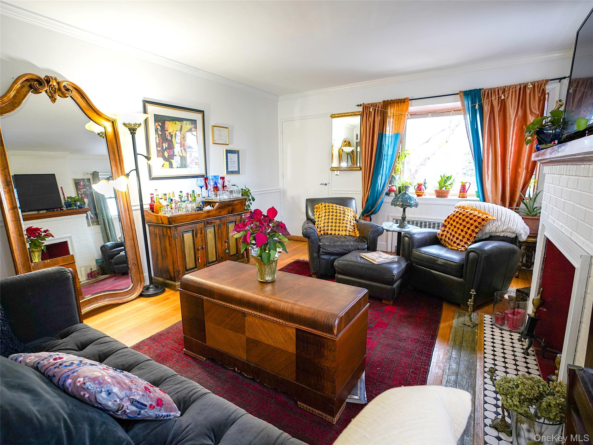 37 Centre Street Bronx, NY 10464 - Photo 3 of 32 a living room with furniture fireplace and a large window