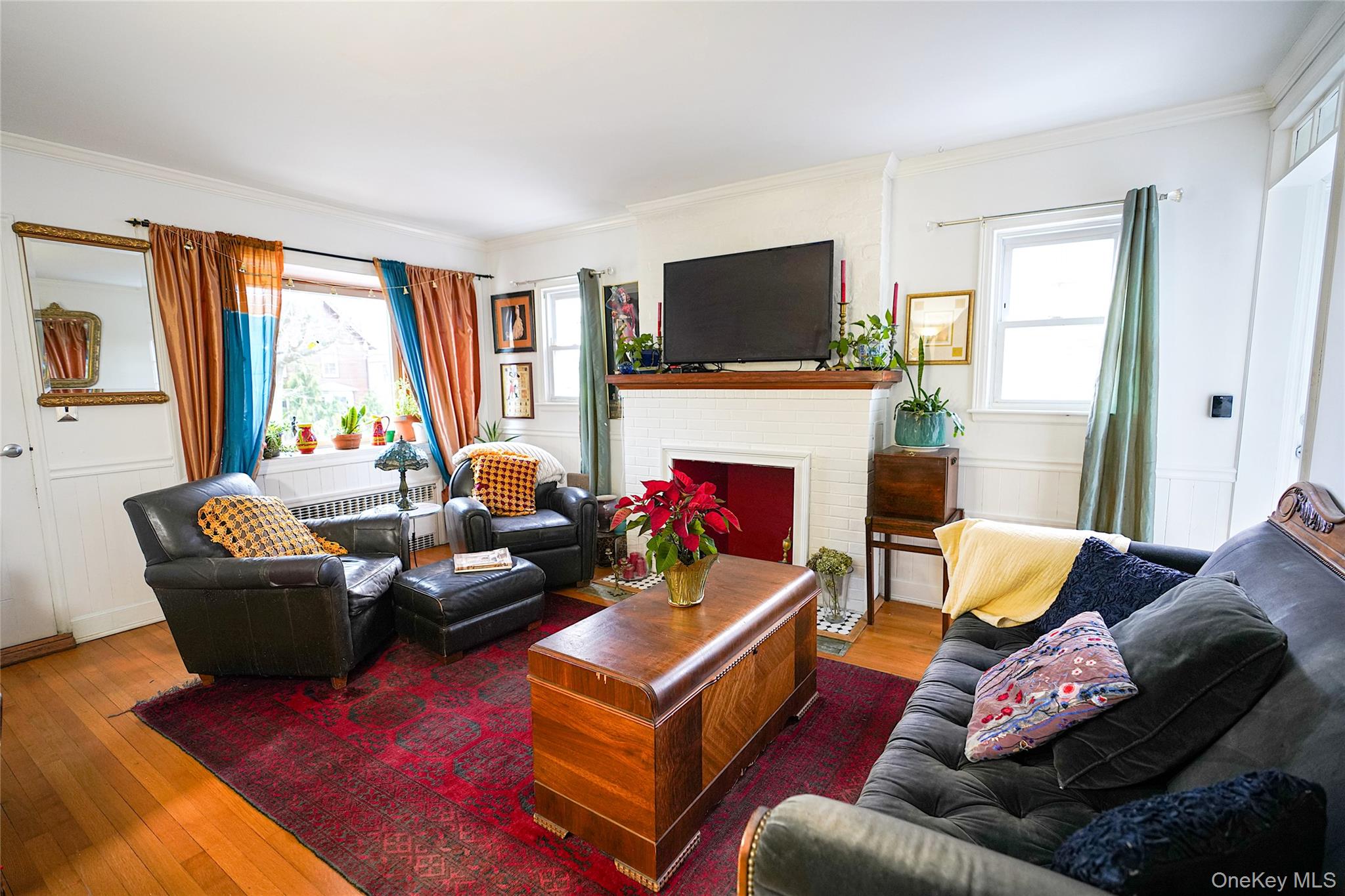 37 Centre Street Bronx, NY 10464 - Photo 4 of 32 a living room with furniture fireplace and a flat screen tv