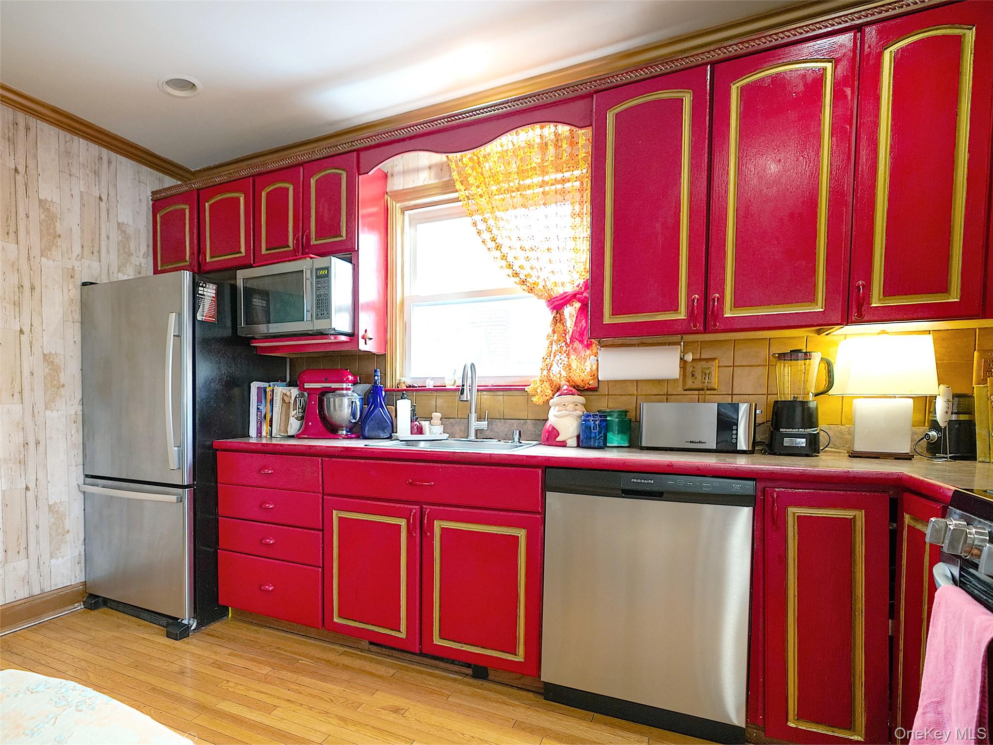 37 Centre Street Bronx, NY 10464 - Photo 6 of 32 a kitchen with stainless steel appliances a refrigerator sink and cabinets