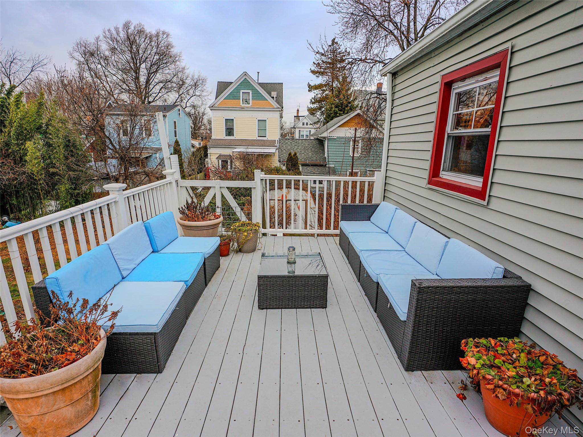 37 Centre Street Bronx, NY 10464 - Photo 7 of 32 a balcony with wooden floor table and chairs