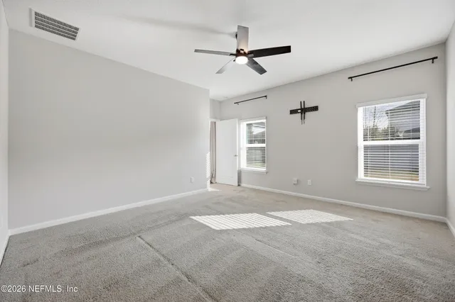 a view of a hallway with closet