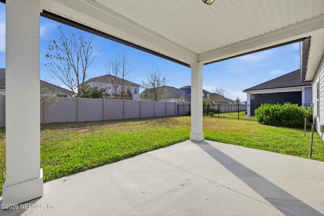 a view of swimming pool with outdoor seating