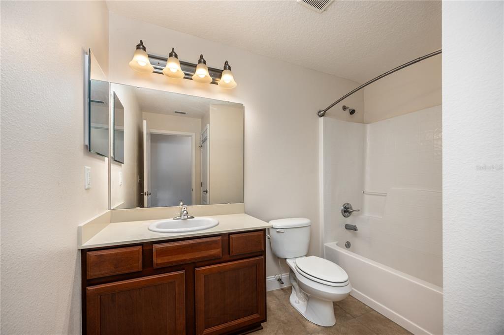 8216 Northwest 54th Street Gainesville, FL 32653 - Photo 45 of 58 a bathroom with a sink toilet and shower