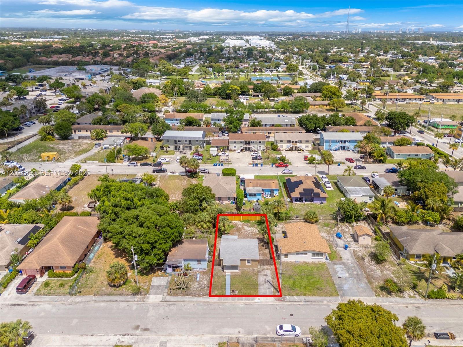 1660 West 26th Street Riviera Beach, FL 33404 - Photo 25 of 28 an aerial view of residential houses with outdoor space