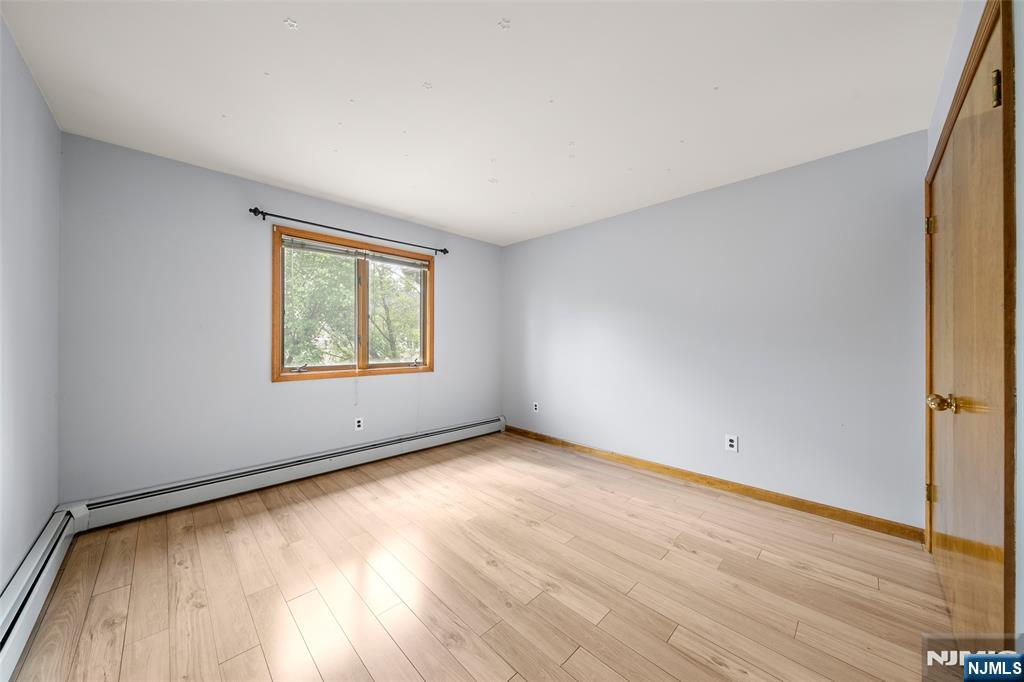 140 Allwood Road, Unit C Clifton, NJ 07012 - Photo 24 of 31 an empty room with windows