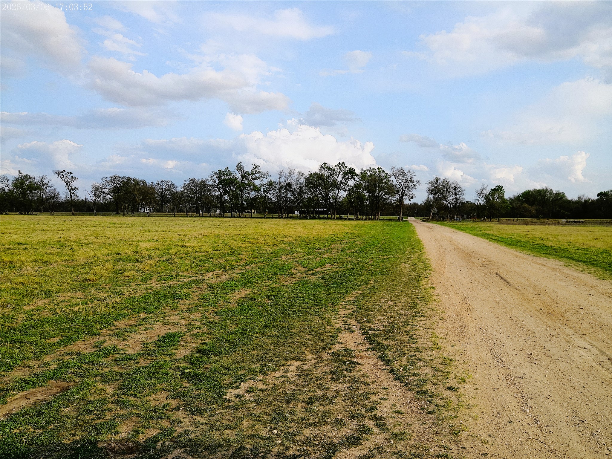 1042 Los Ranchitos Road Cameron, TX 76520 - Photo 12 of 40 View of dirt / gravel road with a view of countryside